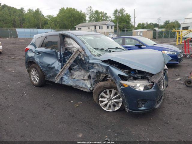  Salvage Mazda Cx